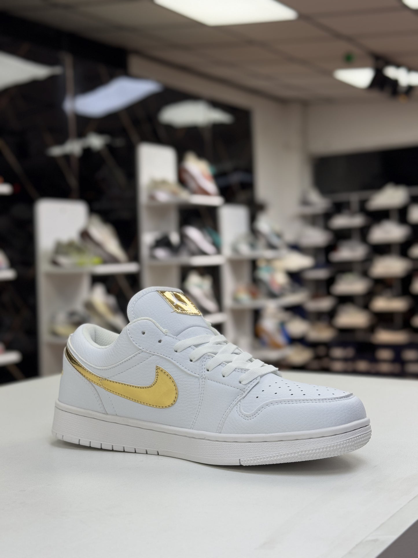 Air Jordan White Gold Logo Sneaker